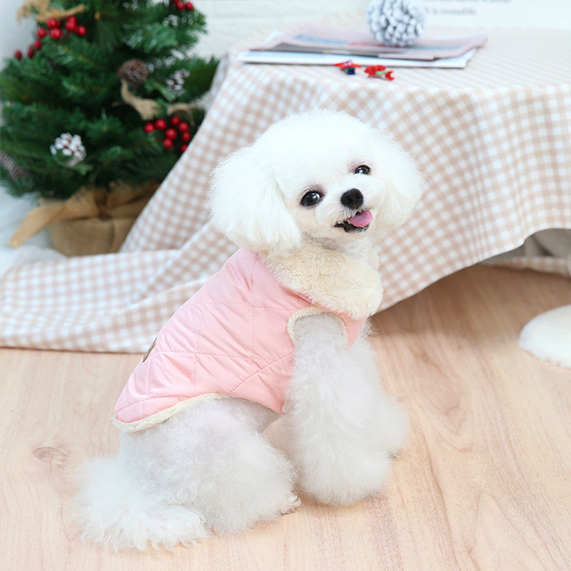 Pink quilted dog coat with plush lining and hood-like collar, worn on small dog