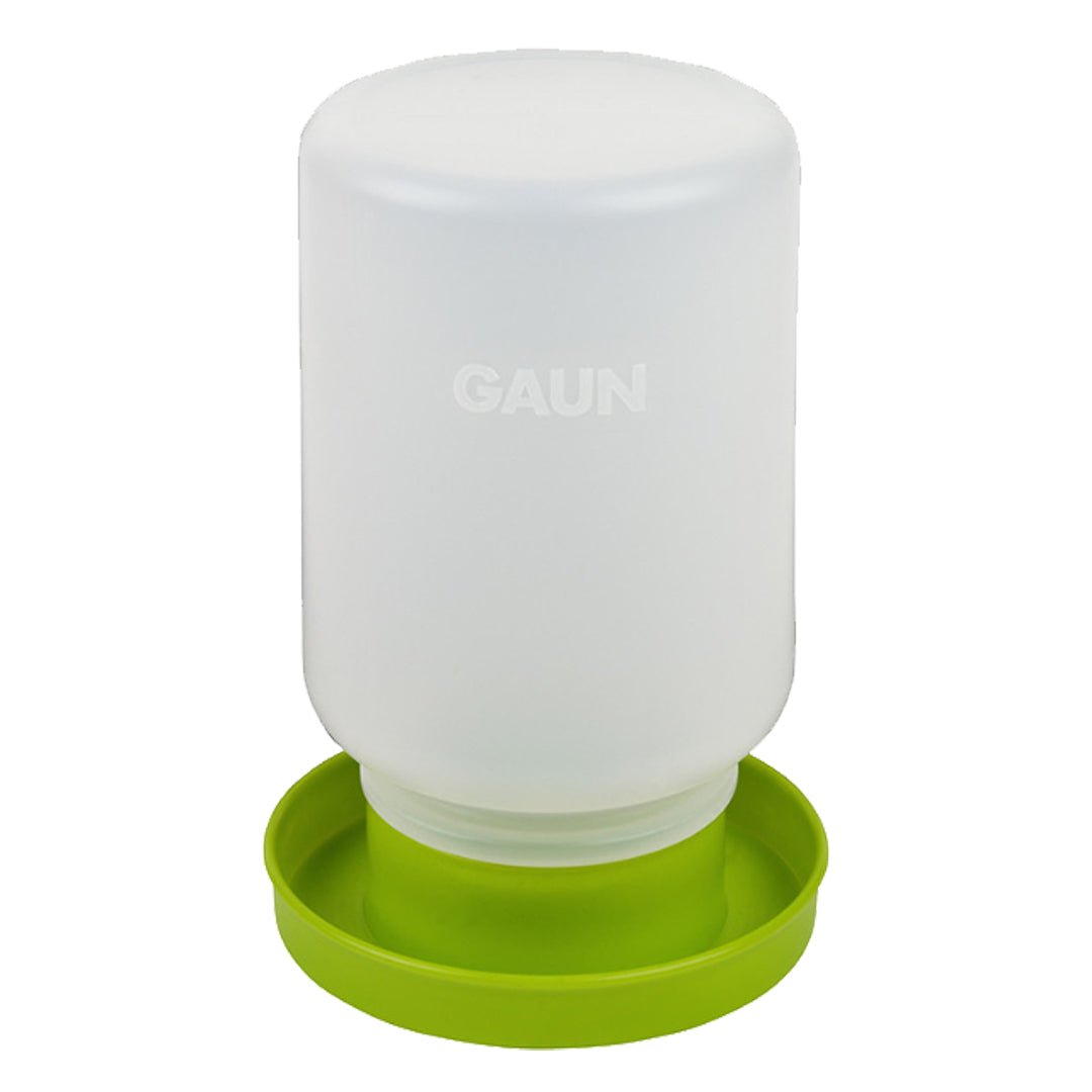 Translucent white gravity chick waterer jug with green base, front view
