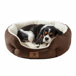 Round sherpa fleece pet bed with brown fabric and cream interior, plush bolstered rim