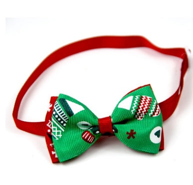 Christmas bow tie for pets with red neck strap and green snowflake bow