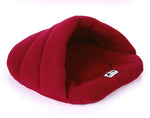 Deep red pet cave sleeping bag with plush hood and logo patch