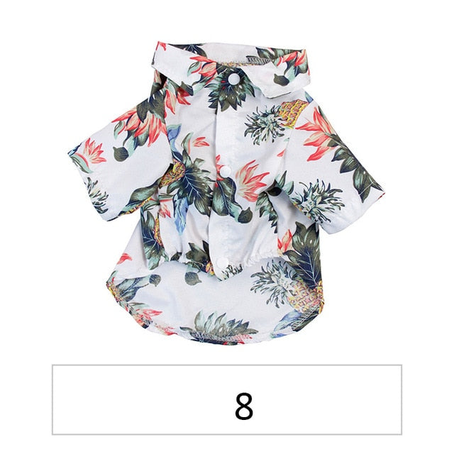 White tropical pet shirt with red, green, and blue palm leaf and pineapple print