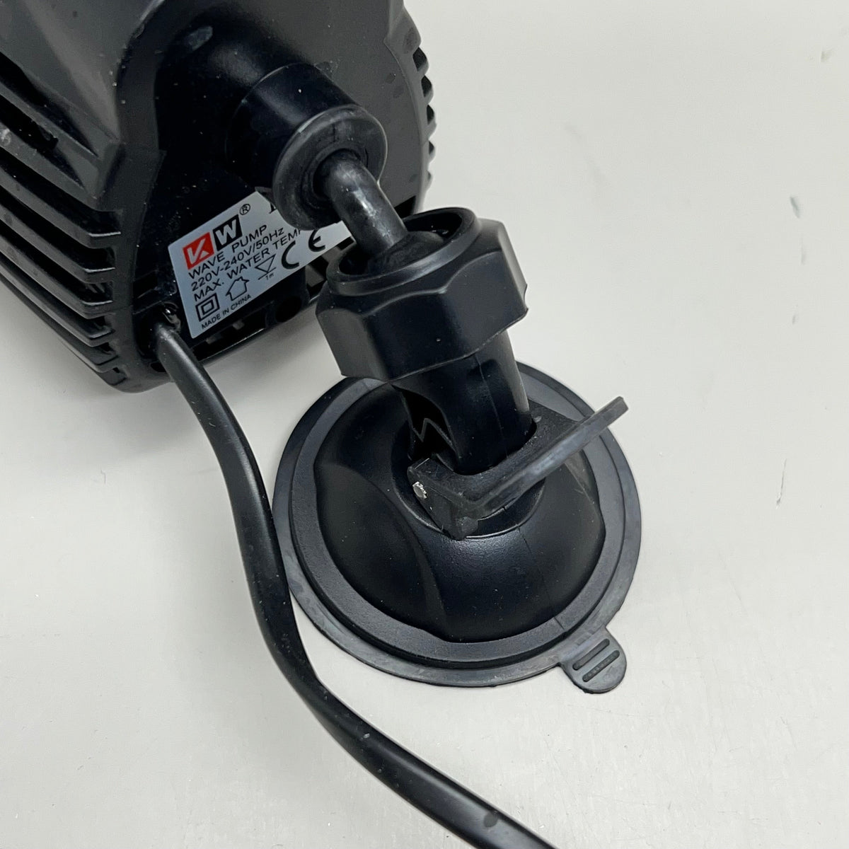 Suction mount base and pump inlet connection with black tubing attachment