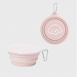 Pink foldable pet travel bowl set with stacked bowls and metal carabiner clip
