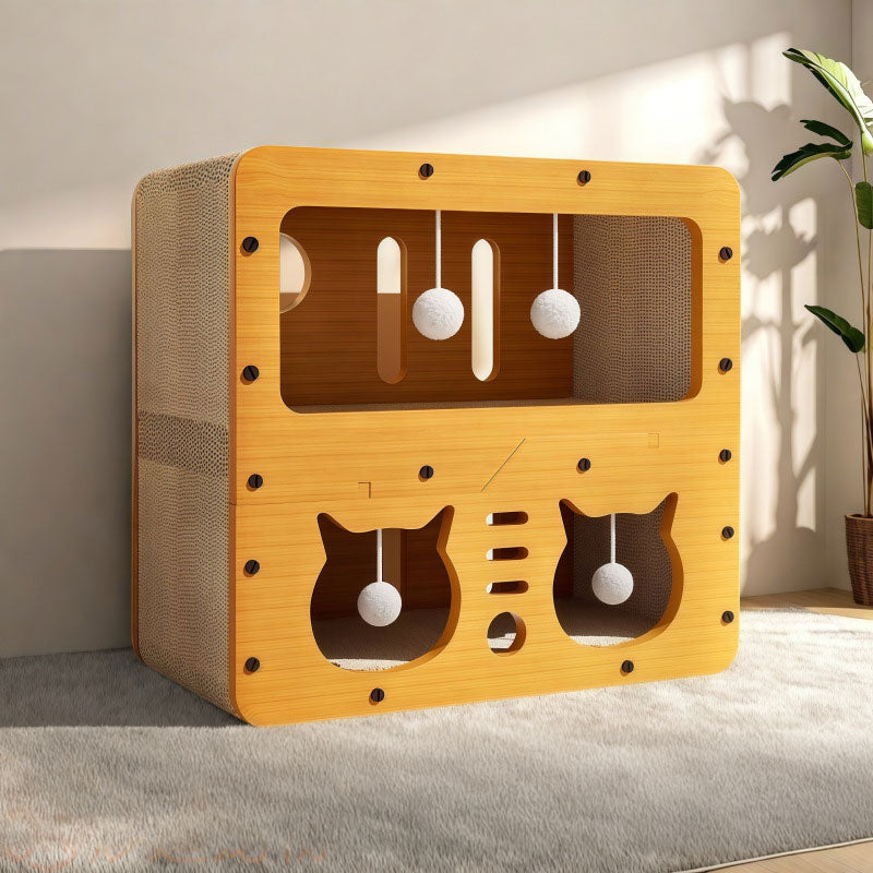 Cardboard cat house with wooden frame and three cat-window cutouts, plush ball toys