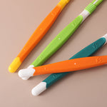 Three-sided pet toothbrushes with orange, green, yellow, and teal handles