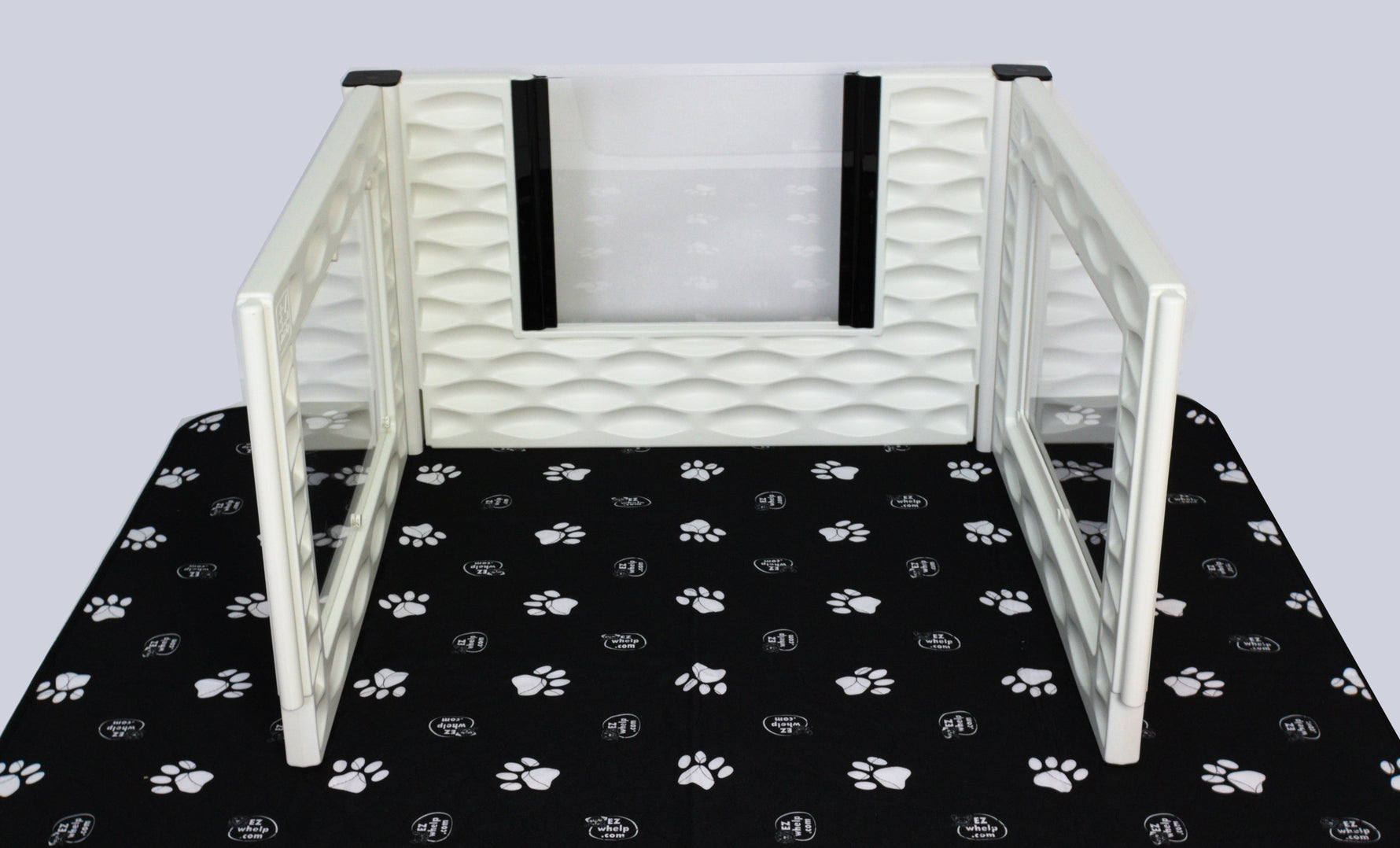 Front view of windowed add-on room insert with black paw-print mat