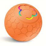 Orange smart bouncing ball with glowing paw emblem and hex-pattern surface