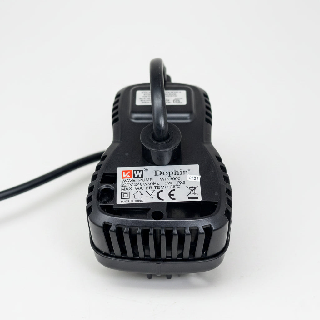 Black pump controller housing with label and upright outlet tube
