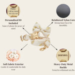 Ivory velvet dog harness with large bow and gold hardware; reinforced metal buckle detail