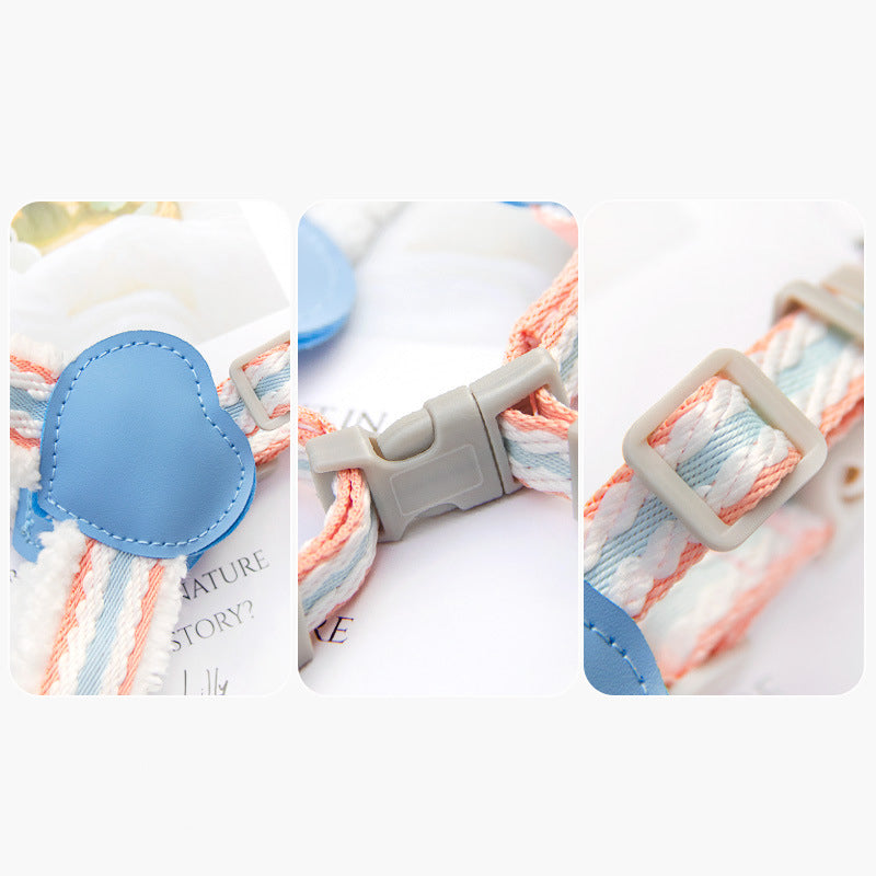 Close-up of breathable dog chest harness: blue heart patch, stitching, and clip