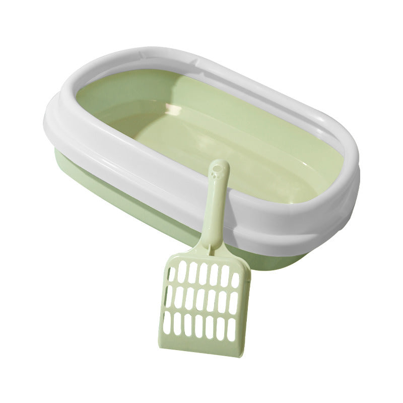 Anti-splash litter box tray in light green with white frame and matching scoop