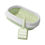 Anti-splash litter box tray in light green with white frame and matching scoop