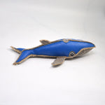 Blue dolphin plush toy with stitched fin details and black-and-white eye patch