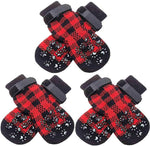 Set of red and black plaid dog socks with paw-print anti-skid grip soles