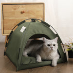 Pet tent bed with cushion in olive green, arched entrance, cat inside