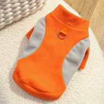 Fleece-lined pet sweater in orange with light gray side panels and front D-ring leash strap