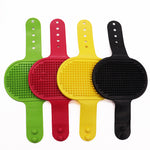 Set of colorful silicone pet grooming brushes with finger massage bristles
