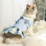 Pet cat outfit: light blue top with plaid bow and tartan skirt