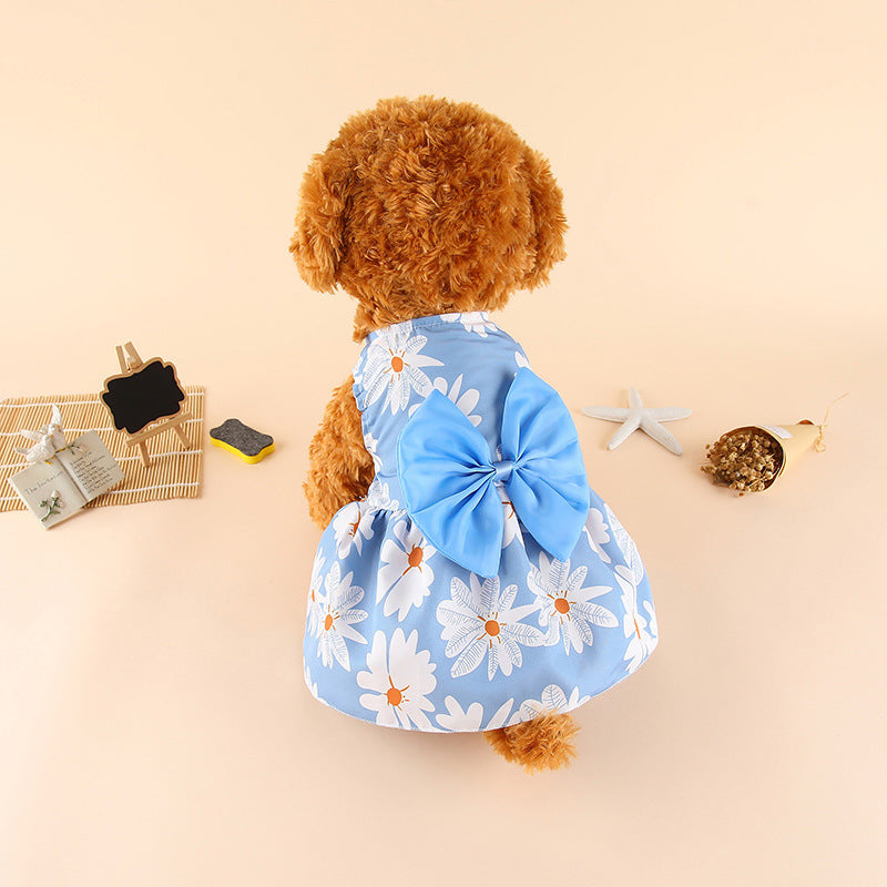 Light blue floral pet dress with white daisy print and bow detail