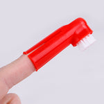 Red pet finger toothbrush with soft white bristles