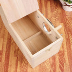 Pine wooden birdhouse with open interior and circular access opening