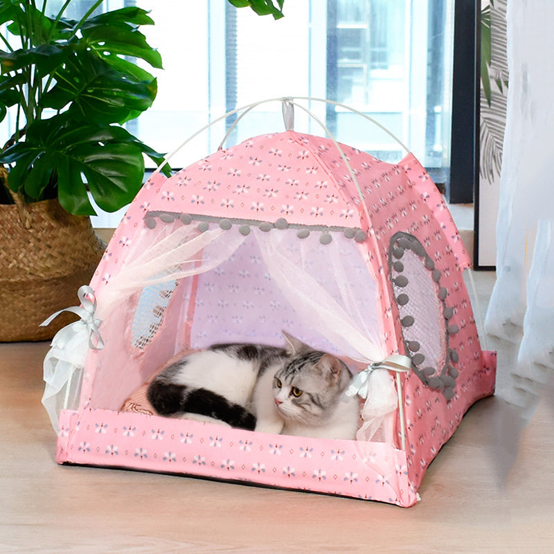 Pink pet tent bed with mesh doorway and side pet cushion, cat resting inside
