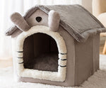 Gray and white enclosed pet house bed with plush bear ears and arched door