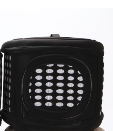 Foldable pet carrier handbag in black with front mesh window and perforated sides