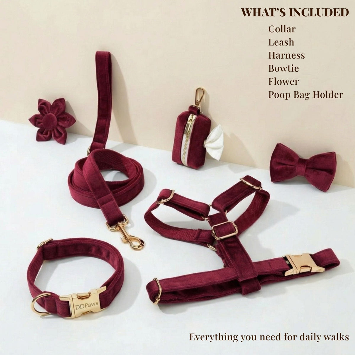 Red wine velvet pet set pieces: collar, leash, harness, bowtie, flower, and poop bag holder