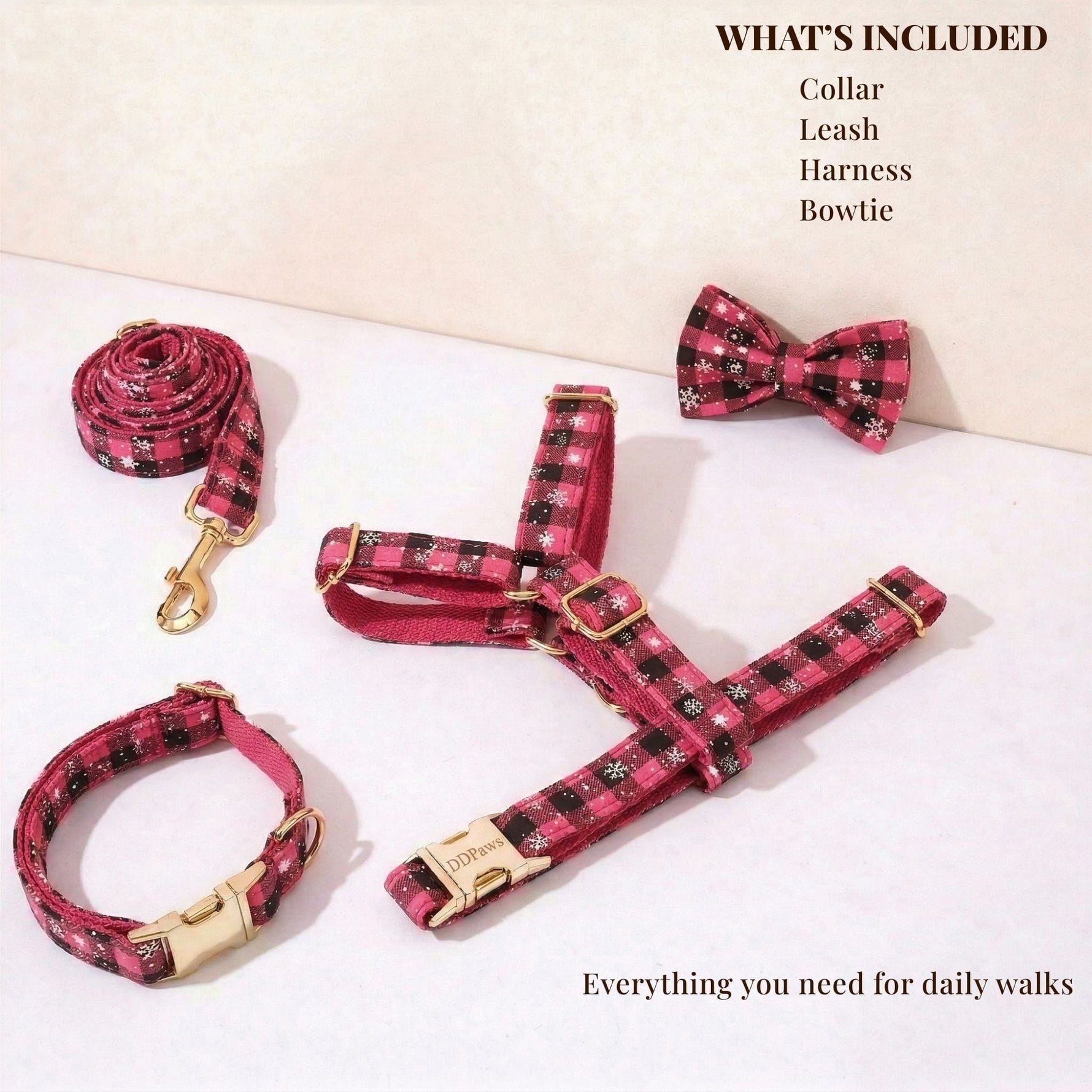 Plaid dog collar, leash, and harness set with bowtie in dark red and black, gold hardware