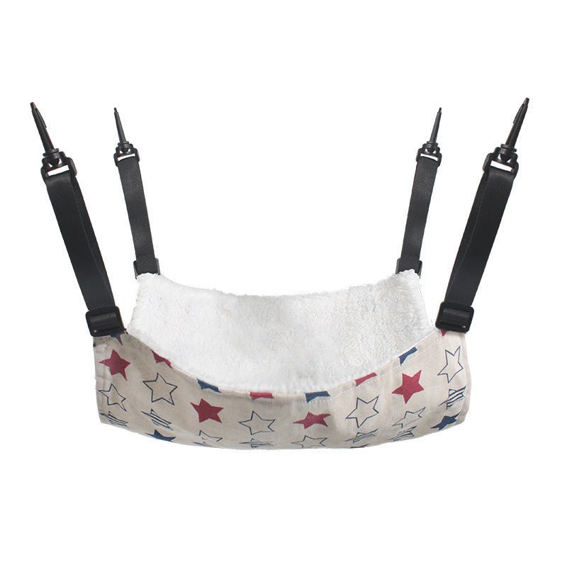 Cat hanging fleece hammock bed with light print fabric, plush white lining, and four straps