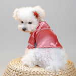 Pink satin pet pajama shirt with button placket, collar trim, and short sleeves
