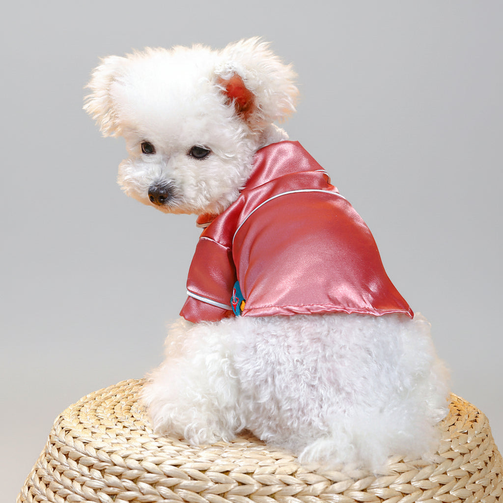 Pink satin pet pajama shirt with button placket, collar trim, and short sleeves