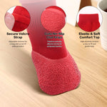 Red anti-slip dog sock with textured paw-grip sole and elastic knit cuff.