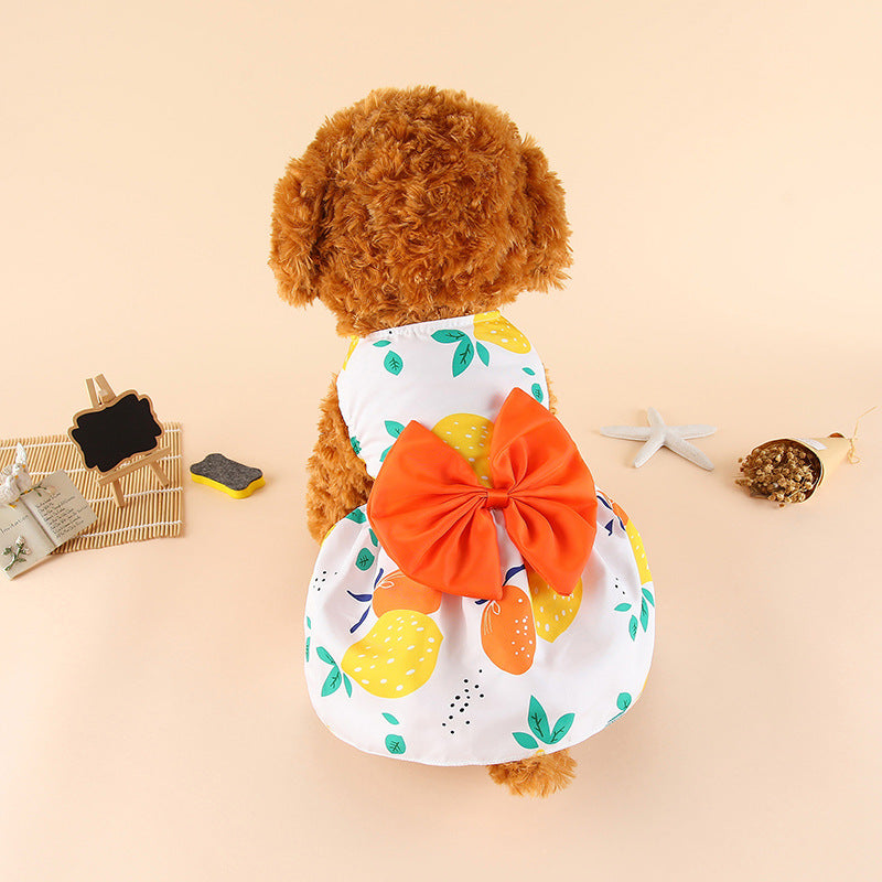 White citrus-print pet dress skirt with orange bow and yellow accents