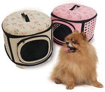 Two foldable pet carriers, pink and beige, each with front mesh door and black trim