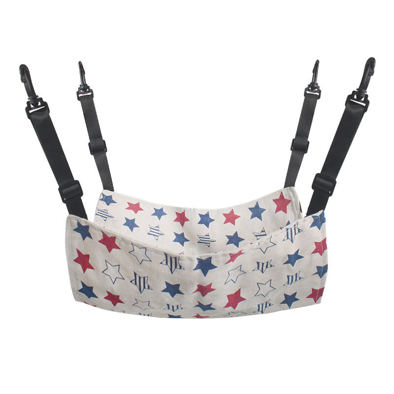 Cat hanging hammock bed with black straps, red and blue star-pattern cushion