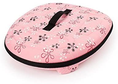 Pink foldable pet carrier with floral fabric, black trim, and a front mesh window