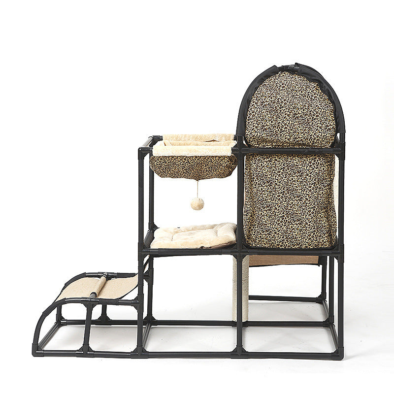 Cat climbing tree condo with leopard fabric panels, cushioned steps, and covered tunnel dome.