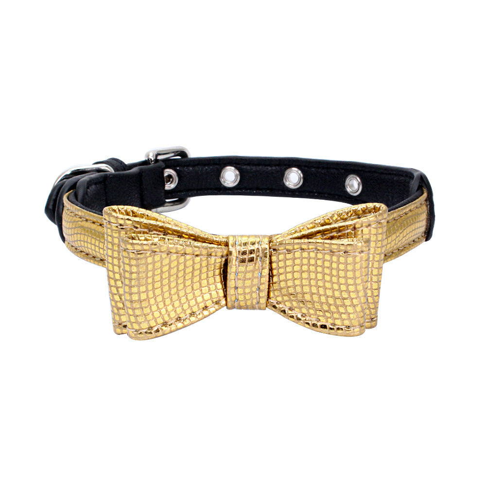 Pet collar with gold metallic strap and bow, silver grommet studs, shiny mesh texture