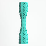 Teal-blue ridged dog chew toy clip with zigzag bite ridges and textured gripping sides