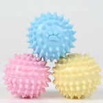 Spiky dog throwing toy with paw print, light blue silicone ball