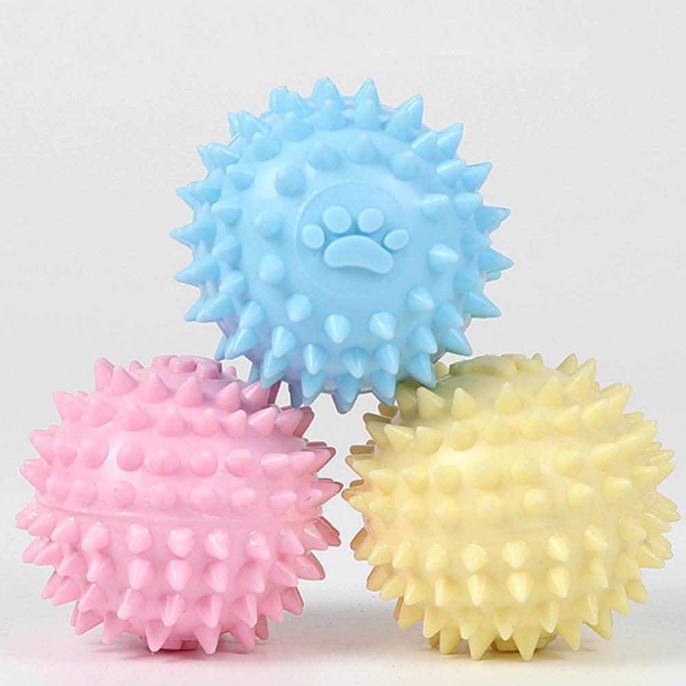 Spiky dog throwing toy with paw print, light blue silicone ball