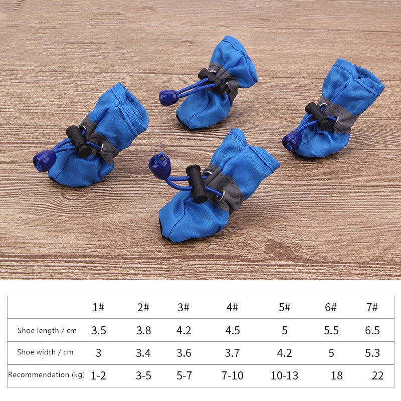 Blue dog soft-soled pet shoes with black cord toggles and gathered trim