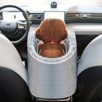 Grey pet car seat with plush inner cushion and padded rim for small dogs