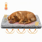 Brown dog sleeping on gray plush pet mattress with textured non-slip bottom