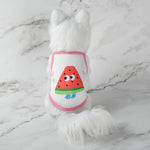 Cute pet tank top with white fur and pink trim, watermelon cartoon face graphic on front.