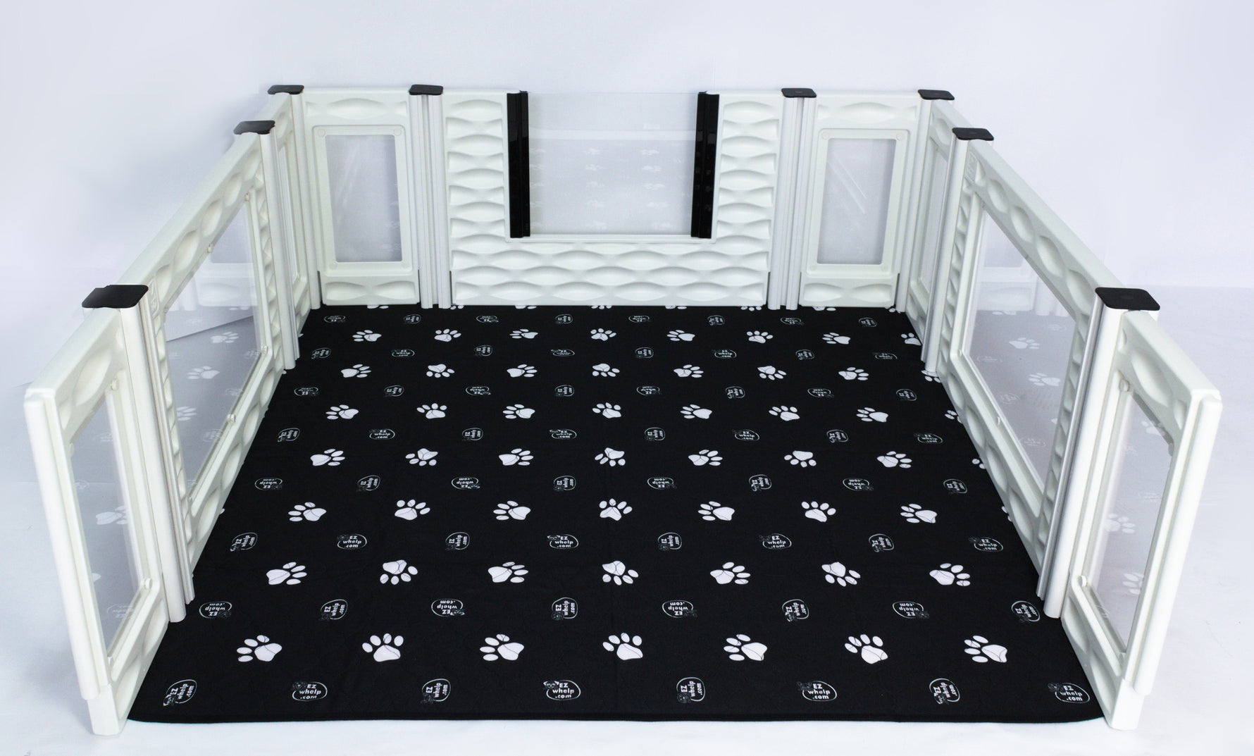Windowed room add-on insert with white frame and black paw-print mat
