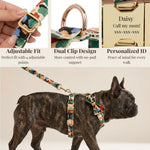 Floral dog collar with detachable bowtie and leash, worn on a small dog